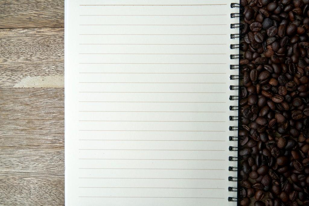 Fresh vegetables and fruits arranged on a wooden table representing healthy nutrition